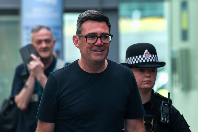 Newly elected Makerfield MP and former Greater Manchester Mayor Andy Burnham walks at Manchester Piccadilly station as he leaves for London, in Manchester, Britain, June 22, 2026. REUTERS/Temilade Adelaja