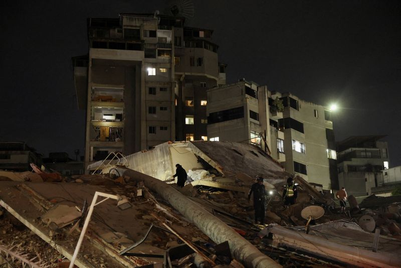 Emergency services work at the site of a collapsed building after an earthquake in Caracas, Venezuela, June 24, 2026. REUTERS/Leonardo Fernandez Viloria