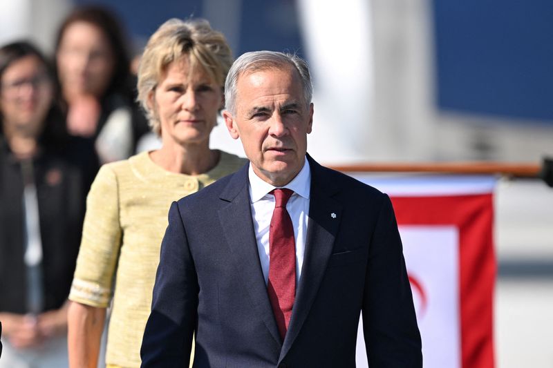 ANKARA, TURKIYE - JULY 07: Canadian Prime Minister Mark Carney and his wife, Diana Fox Carney, arrive at Ankara Airport to attend the 36th NATO Heads of State and Government Summit in Ankara, Turkey, on July 07, 2026.   Muhammed Abdullah Kurtar/Pool via REUTERS