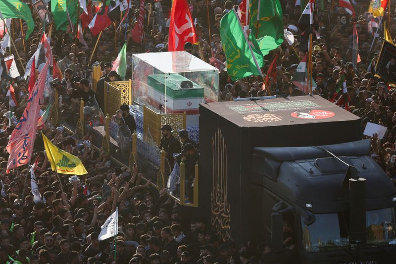 A vehicle carrying the coffin of Iran's late Supreme Leader Ayatollah Ali Khamenei, who was killed on February 28 in Israeli and U.S. airstrikes, makes its way as people attend Khamenei's funeral procession, in Najaf, Iraq, July 8, 2026. REUTERS/Alaa Al-Marjani
