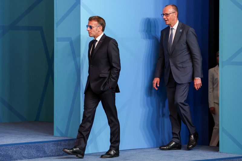 France's President Emmanuel Macron and German Chancellor Friedrich Merz attend a NATO leaders' summit in Ankara, Turkey, July 8, 2026. REUTERS/Umit Bektas