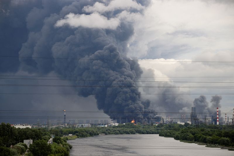 FILE PHOTO: Thick plumes of smoke with flames rise from an oil refinery following a Ukrainian drone attack in the course of Russia-Ukraine conflict, in Moscow, Russia, June 18, 2026, in this picture obtained from social media. SOCIAL MEDIA/via REUTERS