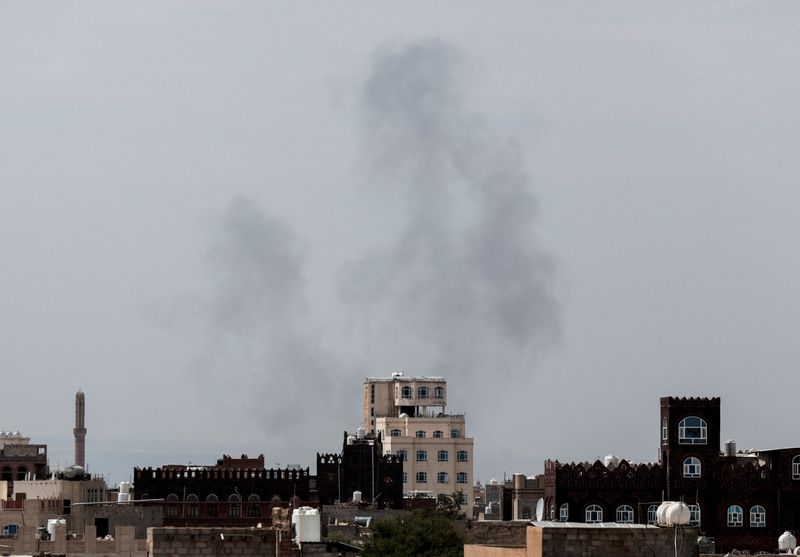 Smoke rises after an airstrike hit the Sanaa International Airport, as seen from Sanaa, Yemen, July 13, 2026. REUTERS/Khaled Abdullah