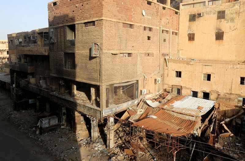 FILE PHOTO: Burnt shops lies down closed in downtown in Khartoum, Sudan June 25, 2026. REUTERS/El Tayeb Siddig/File Photo