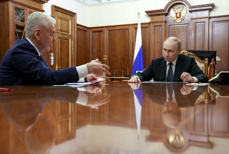Russian President Vladimir Putin meets with Moscow Mayor Sergei Sobyanin at the Kremlin in Moscow, Russia May 5, 2025. Sputnik/Vyacheslav Prokofyev/Pool via REUTERS