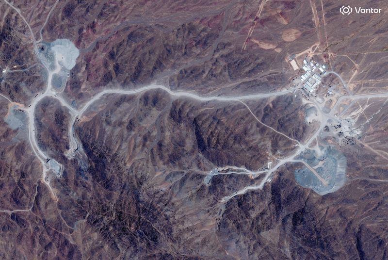 FILE PHOTO: A satellite view shows tunnel entrances at Pickaxe Mountain, of the Natanz nuclear facility, near Natanz, Iran, June 30, 2026. Vantor/Handout via REUTERS/File Photo