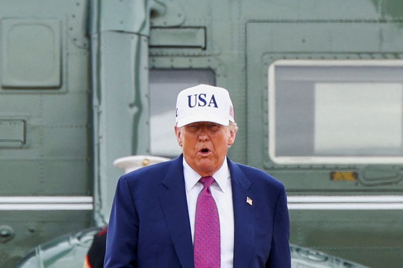 U.S. President Donald Trump steps out of Marine One for a visit to Fort Bragg to mark the U.S. Army anniversary, in North Carolina, U.S., June 10, 2025. REUTERS/Evelyn Hockstein     TPX IMAGES OF THE DAY