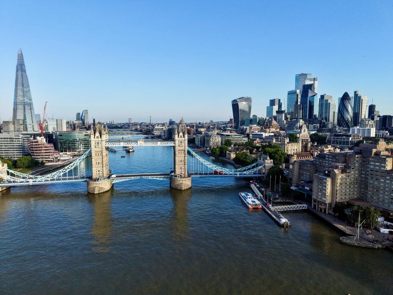 A drone view shows the skyline above central London at sunrise, Britain June 19, 2026. REUTERS/Yann Tessier