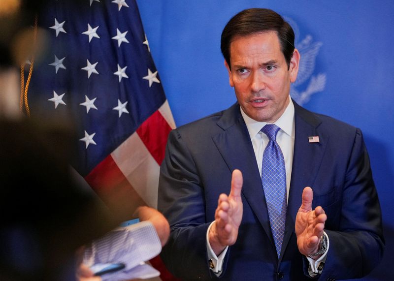 FILE PHOTO: U.S. Secretary of State Marco Rubio speaks with members of the media before departing for Bahrain International Airport after his visit to the Middle East to discuss the interim deal between the U.S. and Iran with Arab Gulf allies, in Manama, Bahrain, June 25, 2026. REUTERS/Eric Lee/Pool/ File Photo