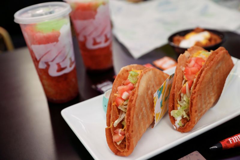 FILE PHOTO: A Taco Bell order and drinks sit inside the first digital-only U.S. location at Times Square in New York City, U.S., April 14, 2021. REUTERS/Shannon Stapleton/File Photo