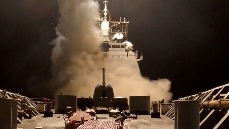 FILE PHOTO: A ship fires missiles at an undisclosed location, after U.S. President Donald Trump launched military strikes against Yemen's Iran-aligned Houthis on Saturday over the group's attacks against Red Sea shipping, in this screengrab obtained from a handout video released on March 15, 2025. U.S. Central Command/Handout via REUTERS/File Photo