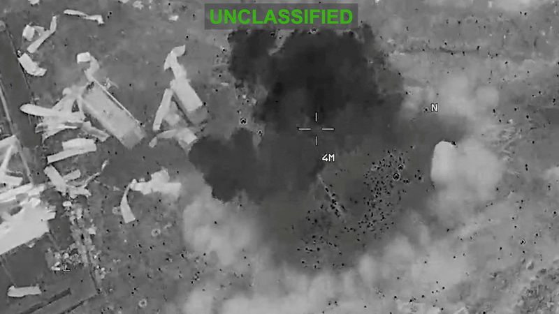 Scattered debris and smoke, at an unknown location, during what the U.S. Central Command (CENTCOM) says are strikes on Iran, in this screengrab taken from a handout video released on July 22, 2026.  U.S. Central Command/Handout via REUTERS