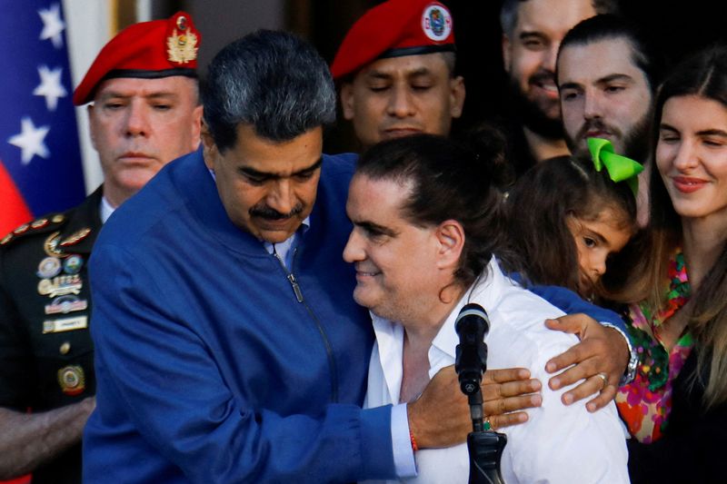 FILE PHOTO: Venezuelan President Nicolas Maduro embraces Alex Saab, who was facing U.S. bribery charges, after he was released by the U.S. government, at the Miraflores Palace, in Caracas, Venezuela, December 20, 2023. REUTERS/Leonardo Fernandez Viloria/File Photo