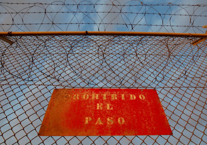FILE PHOTO: The border fence separating Spain's northern enclave Ceuta and Morocco is seen from Ceuta, Spain, June 21, 2018. REUTERS/Juan Medina/ File Photo