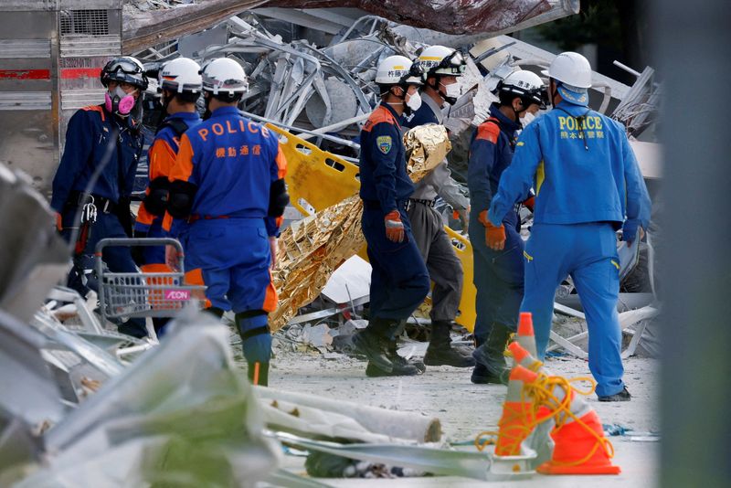 Rescue workers conduct a search operation at the damaged Aeon Mall shopping centre after an earthquake with a magnitude of 7.1 struck Japan's southern Kumamoto Prefecture, in Kashima Town, Kumamoto Prefecture, Japan, July 30, 2026. REUTERS/Kim Kyung-Hoon