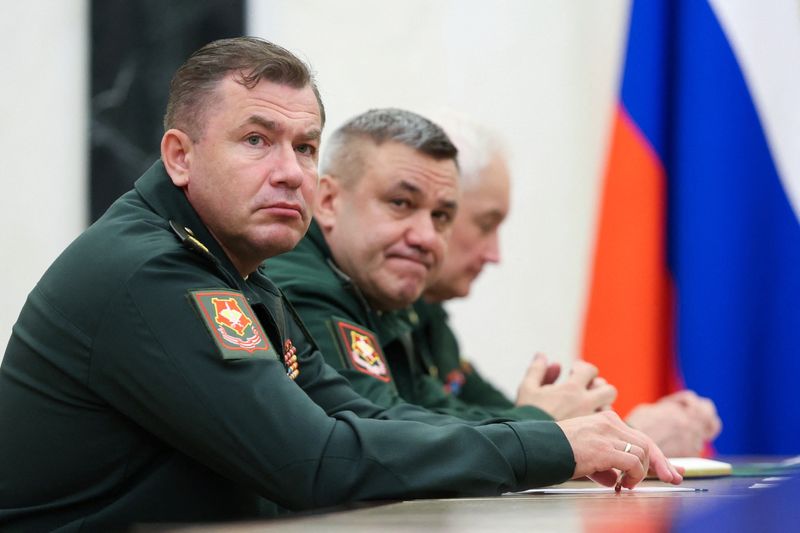 Denis Lyamin, newly appointed head of Russia's Unmanned Systems Forces, Valery Solodchuk, newly appointed head of the Logistics Service, and Defence Minister Andrei Belousov attend a meeting of Russian President Vladimir Putin with the leadership of the Defence Ministry, at the Kremlin in Moscow, Russia August 5, 2026. Sputnik/Alexander Kazakov/Pool via REUTERS