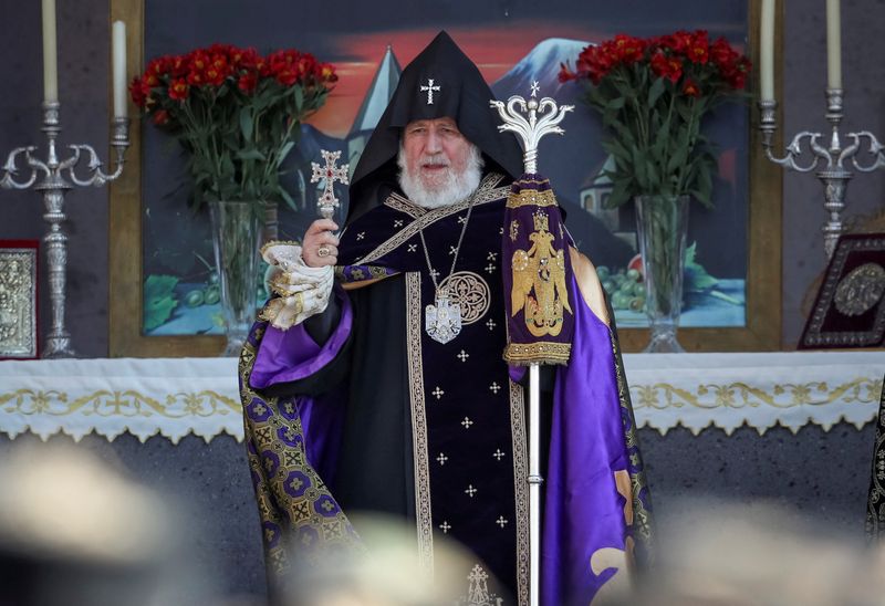 FILE PHOTO: Catholicos of All Armenians Karekin II leads a memorial service to mark Remembrance Day for soldiers fallen in fighting over the Nagorno-Karabakh, in the apostolic Etchmiadzin Cathedral in Vagharshapat, Armenia November 22, 2020. Hayk Baghdasaryan/Photolure Handout via REUTERS/File Photo