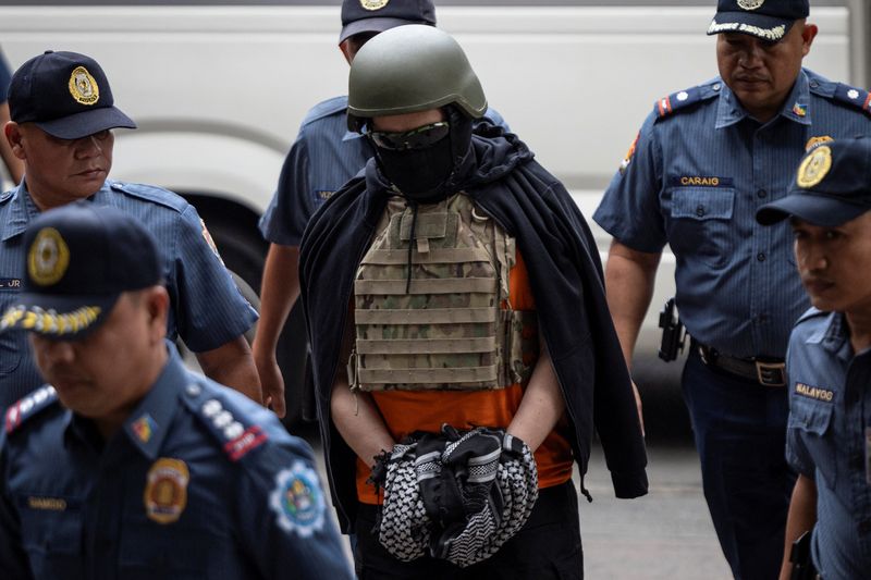 Filipino celebrity pastor Apollo Quiboloy, the self-proclaimed "Appointed Son of God" accused of child abuse and sex trafficking among other charges, arrives at the Pasig Regional Trial Court for an arraignment in Pasig City, Metro Manila, Philippines, September 13, 2024. REUTERS/Eloisa Lopez