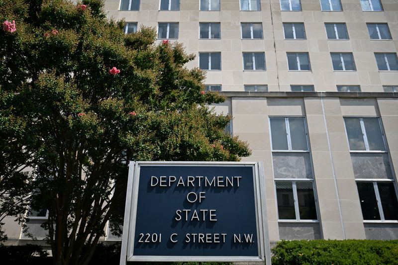 FILE PHOTO: A general view of a U.S. State Department sign outside the U.S. State Department building in Washington, D.C., U.S., July 11, 2025. REUTERS/Annabelle Gordon/File Photo