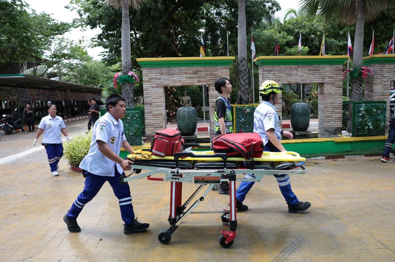 Emergency personnel work outside of Debsirin Nonthaburi School, the site of a shooting incident, in Bang Kruai district in Nonthaburi province on the outskirts of Bangkok, Thailand, August 7, 2026. REUTERS/Chalinee Thirasupa