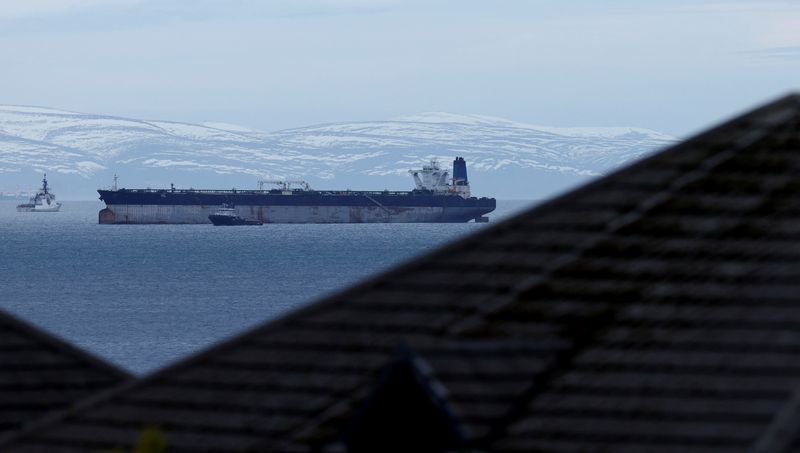Oil tanker Marinera, previously known as Bella 1, which was seized by the U.S. Coast Guard, is moored next to a U.S. Coast Guard vessel in the Moray Firth, off the coast of Scotland, Britain, January 14, 2026. REUTERS/Russell Cheyne/File Photo