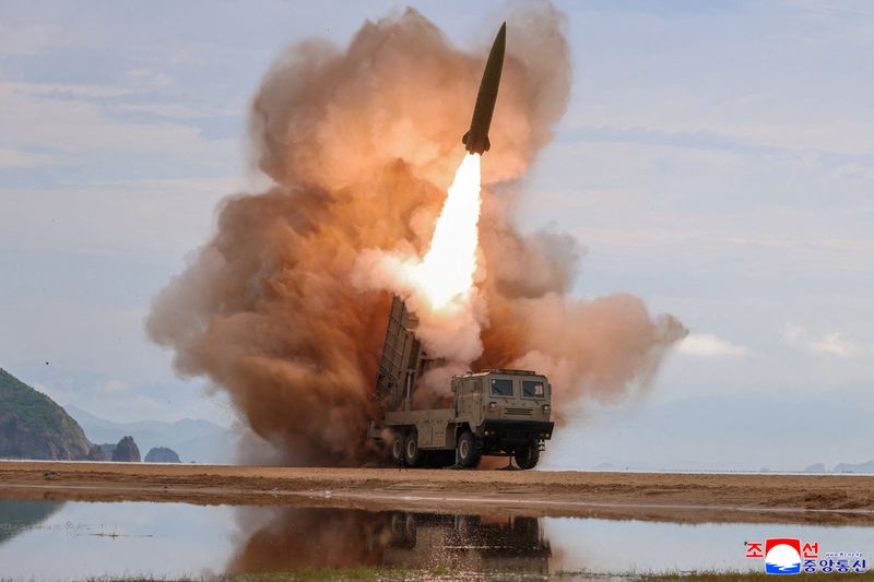 FILE PHOTO: A rocket launcher fires a munition during tests in North Korea, June 25, 2026, in this picture released by North Korea's official Korean Central News Agency.  KCNA via REUTERS/File Photo