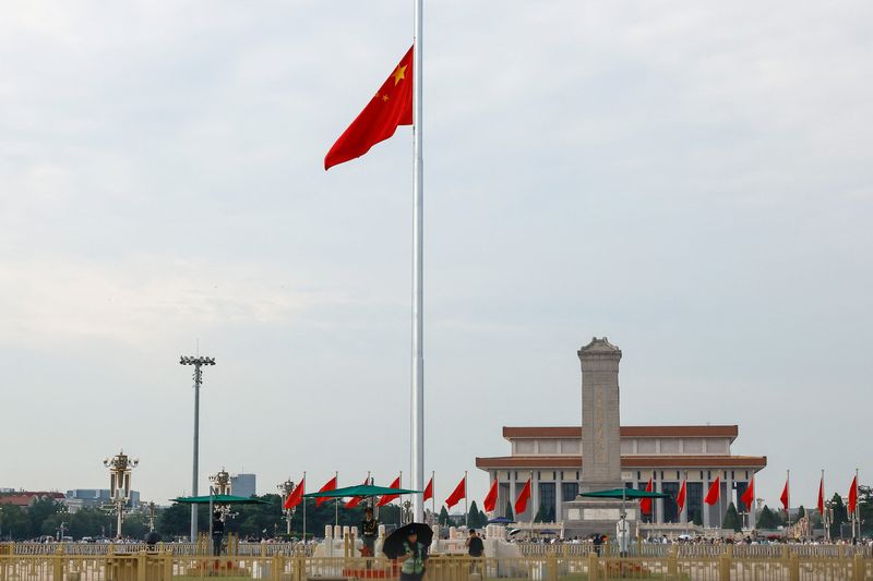The Chinese flag at Tiananmen Square flies at half-mast in memory of the late former Chinese Premier Zhu Rongji, who passed away last Wednesday, aged 97, in Beijing, China, August 18, 2026. REUTERS/Maxim Shemetov