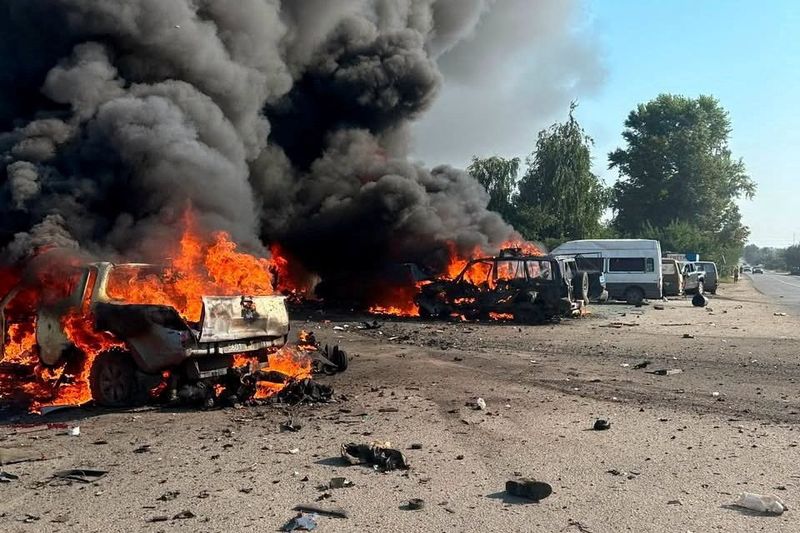 Vehicles burn after Russian drone strikes in the town of Pechenihy, amid Russia's attack on Ukraine in Kharkiv region, Ukraine August 18, 2026. Press service of the State Emergency Service of Ukraine in Kharkiv region/Handout via REUTERS