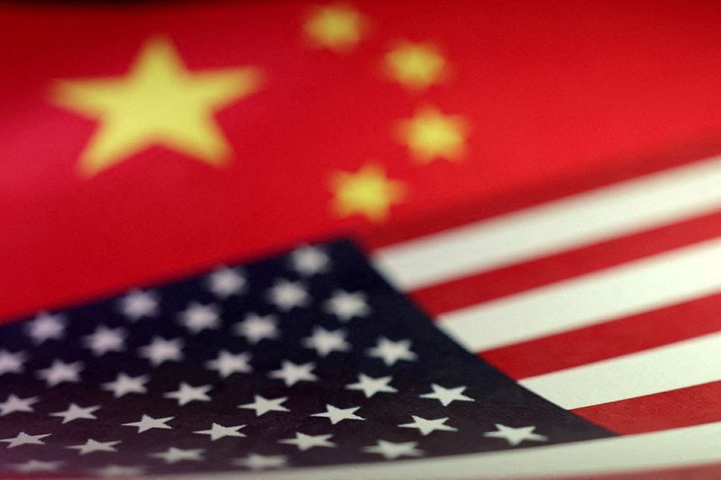 FILE PHOTO: U.S. and Chinese flags are seen in this illustration created on April 10, 2025. REUTERS/Dado Ruvic/Illustration/File Photo/File Photo