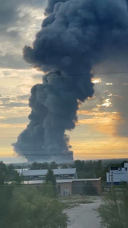 Smoke rises from an Ozon warehouse following a Ukrainian drone attack, in the course of the Russia-Ukraine conflict, in Chapayevsk, Samara region, Russia, August 22, 2026, in this screen grab taken from a social media video. Social Media/via REUTERS