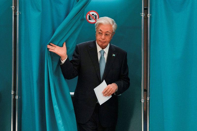 Kazakh President Kassym-Jomart Tokayev walks out of a voting booth at a polling station during a snap parliamentary election in Astana, Kazakhstan, August 23, 2026. REUTERS/Turar Kazangapov
