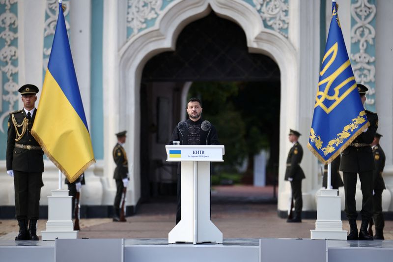 Ukraine's President Volodymyr Zelenskiy delivers a speech during a commemorative ceremony marking Ukraine's 35th Independence Day outside St. Sofia cathedral in Kyiv on August 24, 2026.   HENRY NICHOLLS/Pool via REUTERS