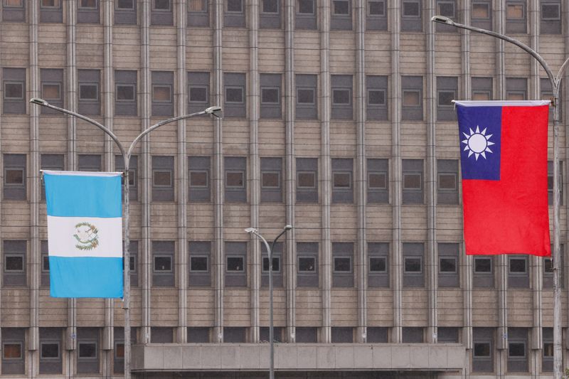 The national flags of Taiwan and Guatemala flutter outside the Presidential Office Building in Taipei, Taiwan June 5, 2025. REUTERS/Ann Wang