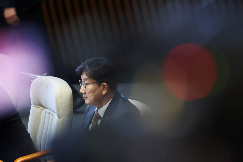 FILE PHOTO: South Korea’s ruling People Power Party floor leader Kweon Seong-dong sits during the impeachment vote of a plenary session for South Korean acting President and Prime Minister Han Duck-soo at the National Assembly in Seoul, South Korea, December 27, 2024.   REUTERS/Kim Hong-Ji/File photo