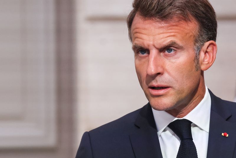 FILE PHOTO: France's President Emmanuel Macron speaks during a joint press conference with Ukraine's President Volodymyr Zelensky following the Coalition of the Willing Summit, at the Elysee presidential Palace, in Paris, France on September 4, 2025.   LUDOVIC MARIN/Pool via REUTERS/File photo