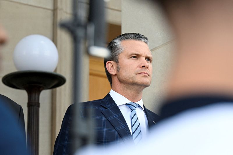 U.S. Defense Secretary Pete Hegseth welcomes Singapore's Defence Minister Chan Chun Sing (not pictured) at the Pentagon in Washington, D.C., U.S., September 9, 2025. REUTERS/Annabelle Gordon/File Photo
