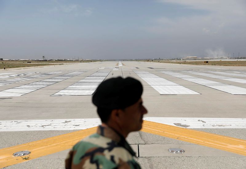 FILE PHOTO: Runway is seen at Bagram U.S. air base, after American troops vacated it, in Parwan province, Afghanistan July 5, 2021. REUTERS/Mohammad Ismail/ File Photo