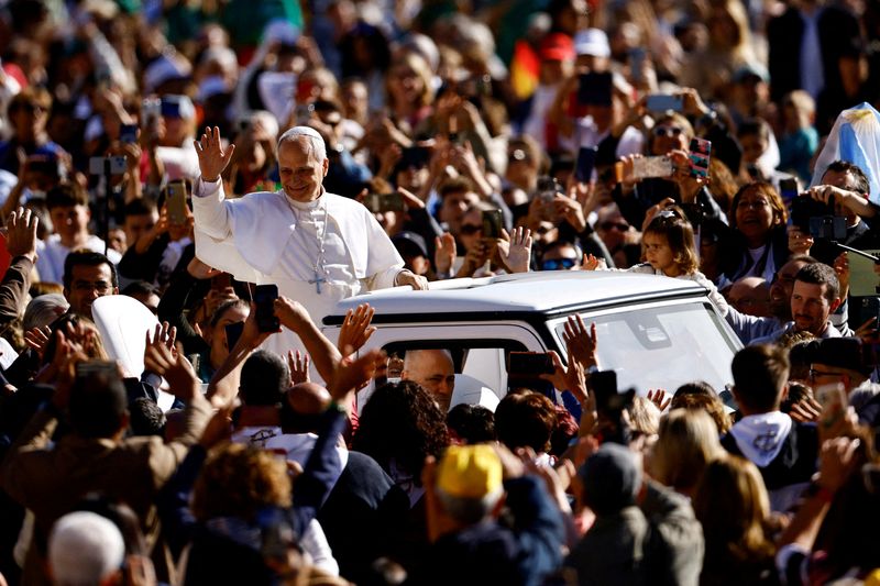 FILE PHOTO: Pope Leo XIV greets people on the day he holds a Jubilee audience on the occasion of the Jubilee of Catechists in St.Peter's Square at the Vatican, September 27, 2025. REUTERS/Francesco Fotia /File Photo