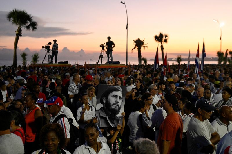Cubans attend a rally in support of Palestinians in Gaza, after U.S. President Donald Trump announced that Israel and Hamas agreed on the first phase of a Gaza ceasefire, in Havana, Cuba October 9, 2025. REUTERS/Norlys Perez