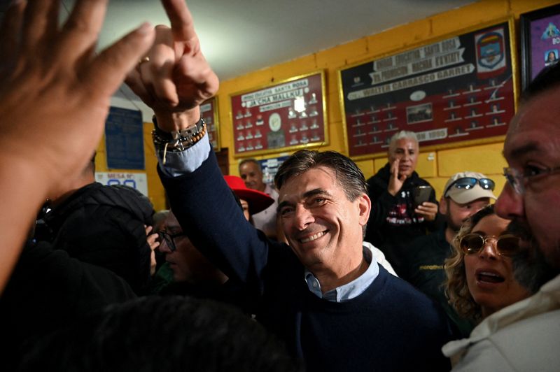 Centrist senator and presidential candidate Rodrigo Paz of the Christian Democratic Party (PDC) reacts during the presidential runoff election in La Paz, Bolivia, October 19, 2025. REUTERS/Claudia Morales