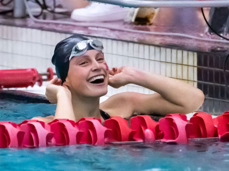 Arrowhead's Campbell Stoll reacts after realizing her team won the 200-yard freestyle relay at the WIAA Division 1 girls state swimming and diving championships at Waukesha South on Saturday, November 12, 2022. Arrowhead's time of 1:31.14 missed the state record by 00.01 seconds.