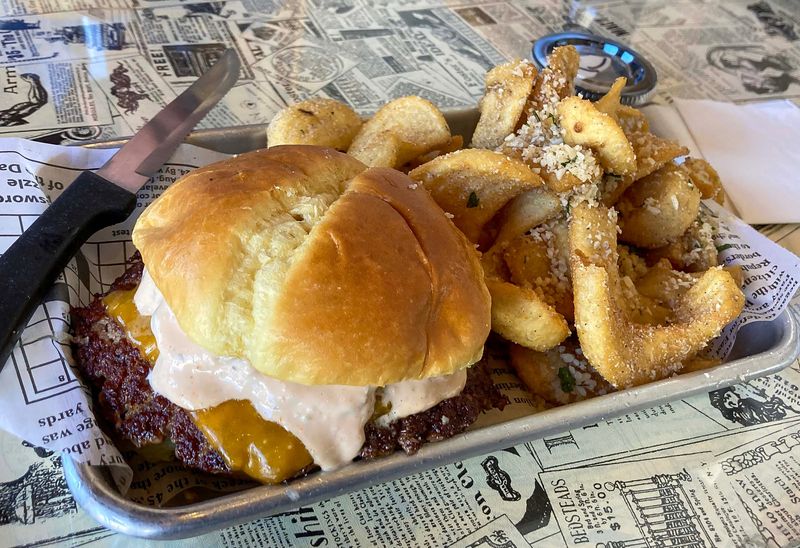 Here is the Press Classic burger as seen, March 8, 2023, at  Local Press Eatery in Sheboygan, Wis.  Also featured are the truffle fries.