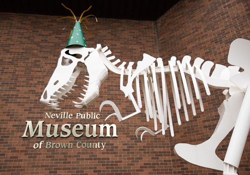 A model dinosaur in front of the Neville Public Museum pictured on June 25, 2023, in Green Bay.