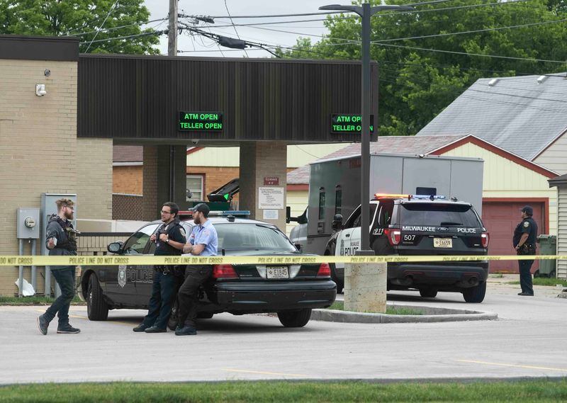 Milwaukee police investigate an attempted robbery of an armored truck at North Shore Bank, 7927 W. Capitol Drive, on July 13, 2023.