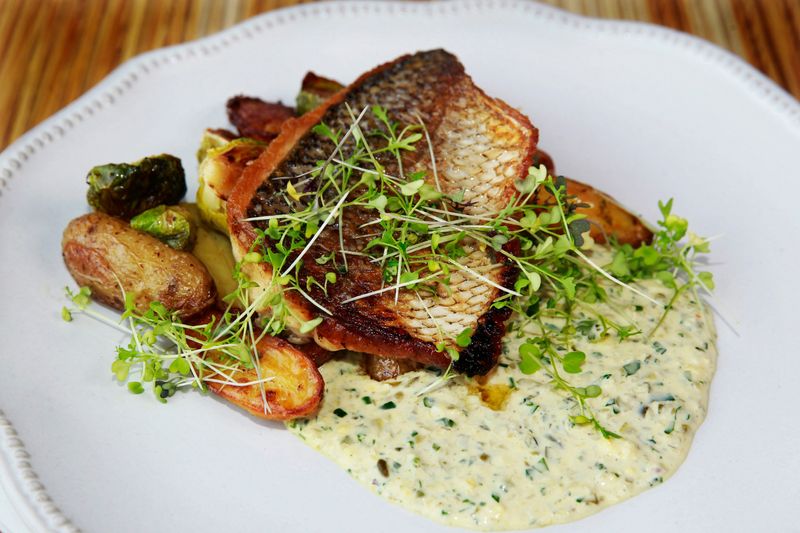Pan-seared whitefish with Brussels sprouts, fingerling potatoes and dill pickle remoulade is a main dish at Brandywine restaurant, W61N480 Washington Ave., Cedarburg.