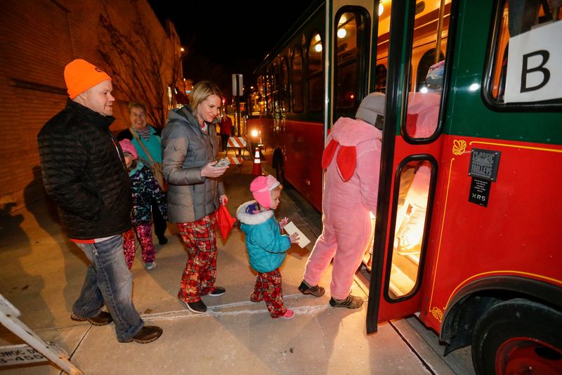 Kids board the 'Magical Trolley Ride to the North Pole' in Manitowoc in this file photo.