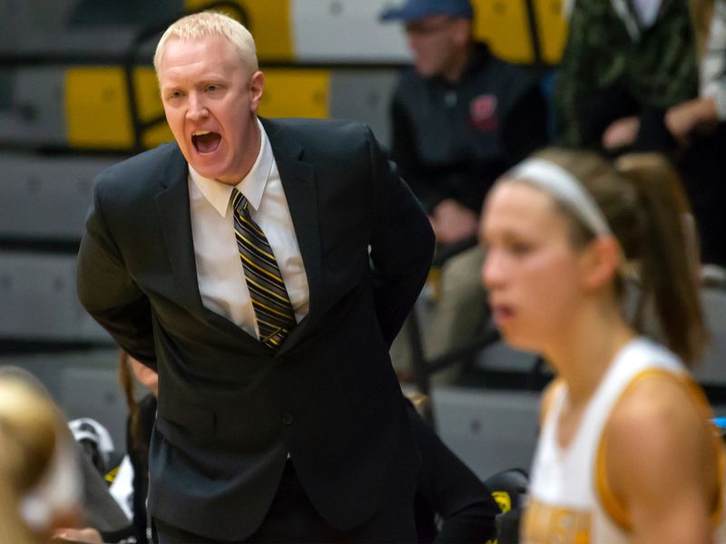 UW-Oshkosh head coach Brad Fischer directs the players on the court at the Kolf Sports Center on Saturday, January 5, 2019.