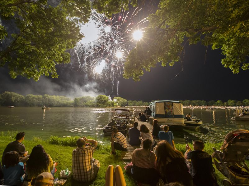 People watch the Festival Foods’ Fourth of July Fireworks display at Menominee Park in this file photo.