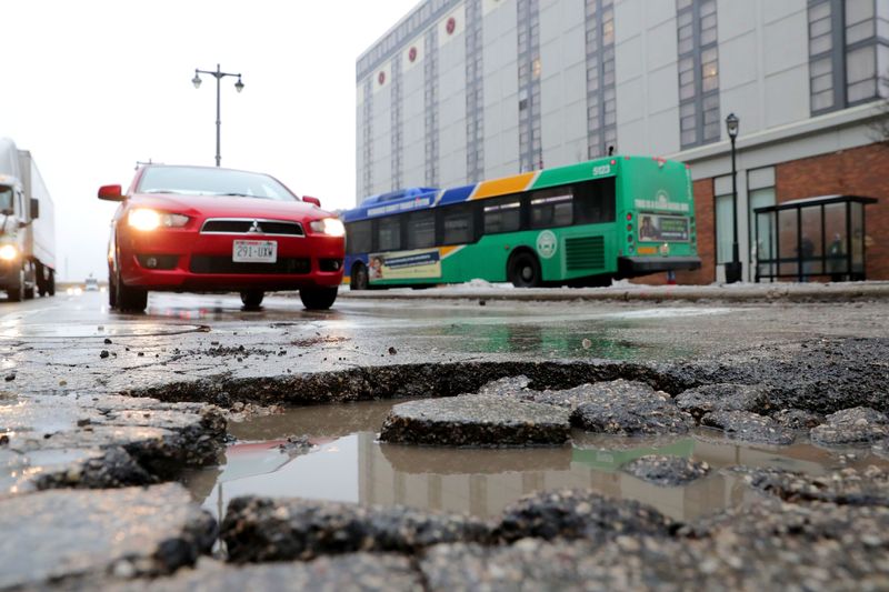 A pothole on North 6th Street near the corner of West Michigan Street in Milwaukee.