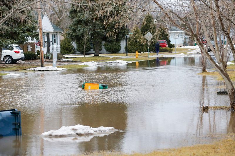 Flood waters remain Friday, March 15, 2019 on north Bell Street south of Johnson Street in Fond du Lac, Wis. Ice jams on the east branch of the Fond du Lac River and heavy rain caused widespread flooding problems in the city on Thursday the 14th. Doug Raflik/USA TODAY NETWORK-Wisconsin
